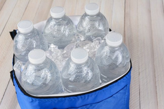 water bottles in cooler for roadtrip