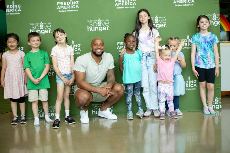 greenbay packer aj dillon with kids