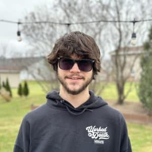 young man outside in sunglasses