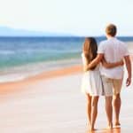 Couple walking on honeymoon vacation