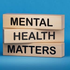 Three wood blocks that say mental health matters