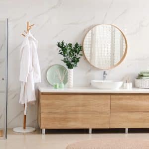 Modern bathroom interior with stylish mirror and vessel sink