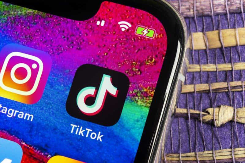 Helsinki, Finland, February 17, 2019: Tik Tok application icon on Apple iPhone X screen close-up. Tik Tok icon. tik tok application. Tiktok Social media network. Social media icon