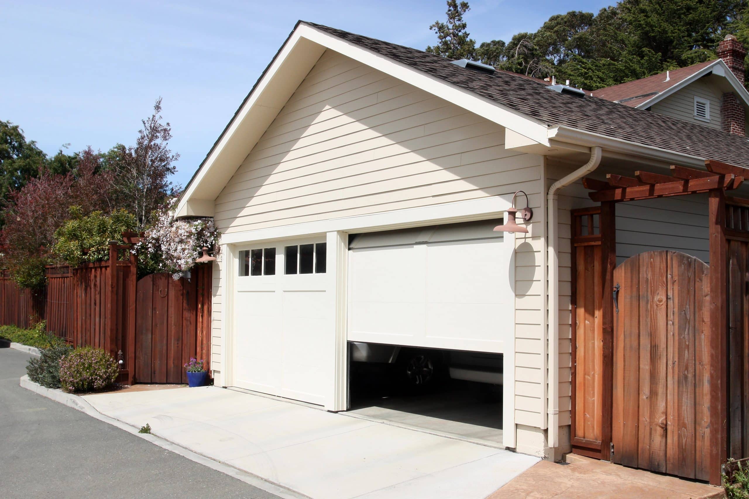 Open garage door in suburban house Open Garage